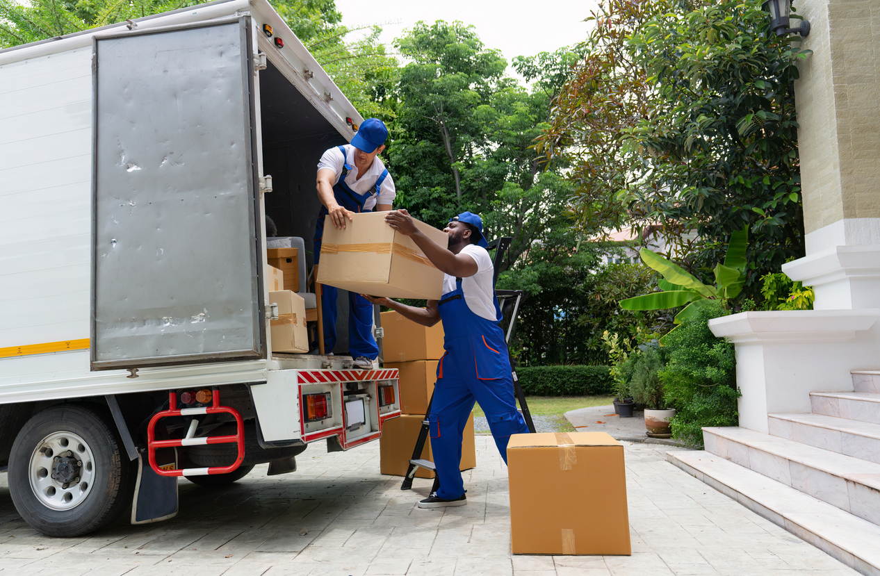 Logistics warehouse with trucks being loaded for delivery in Nigeria