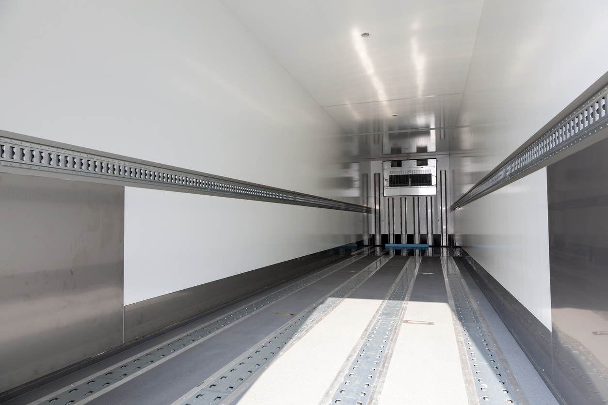 Refrigerated truck loading perishable goods for cold chain delivery